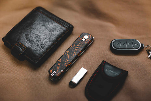 Complete everyday carry EDC kit laid out on a flat surface