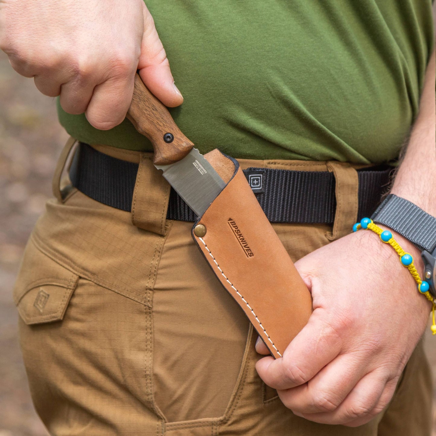 Knife with wooden handle and leather sheath 