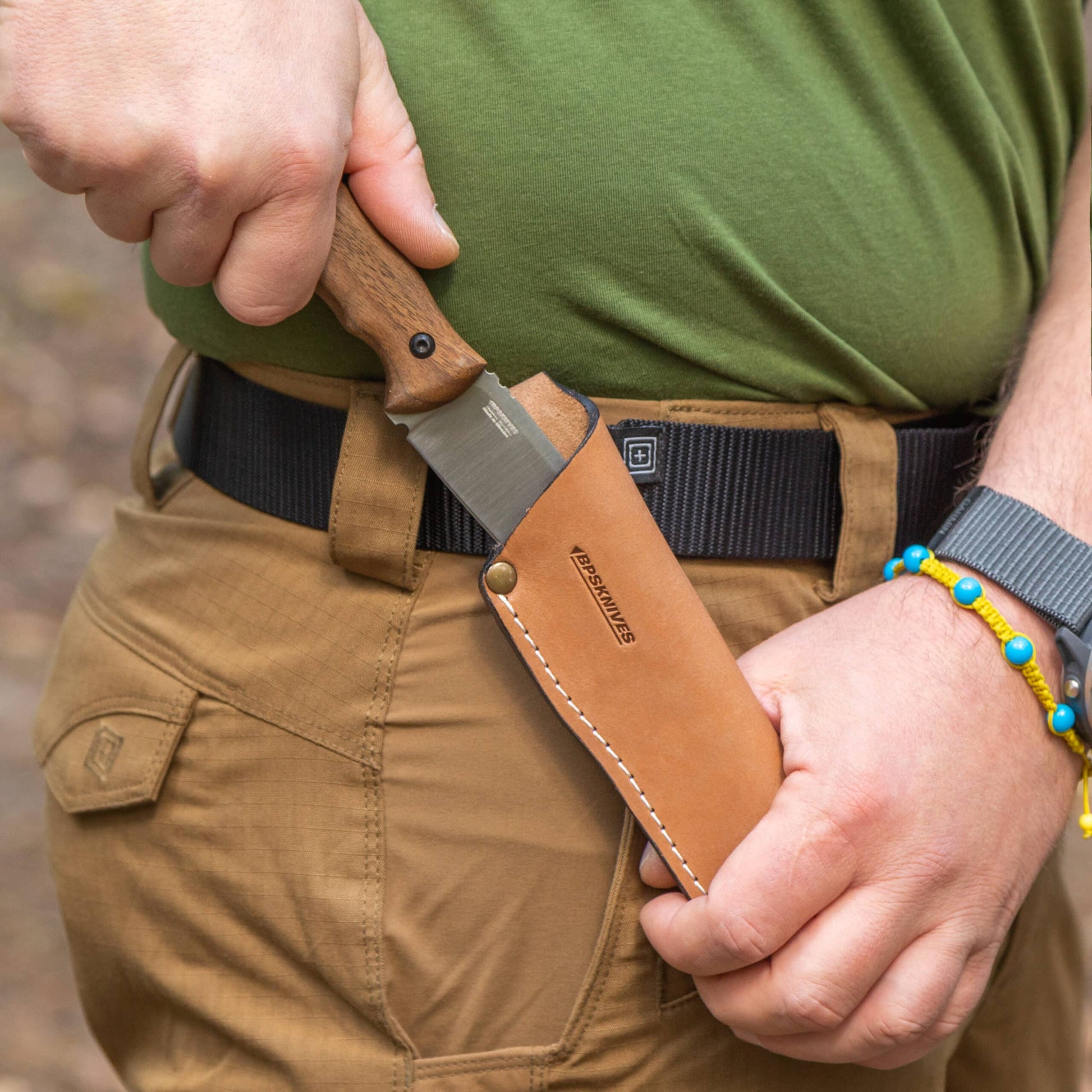 Knife with wooden handle and leather sheath 